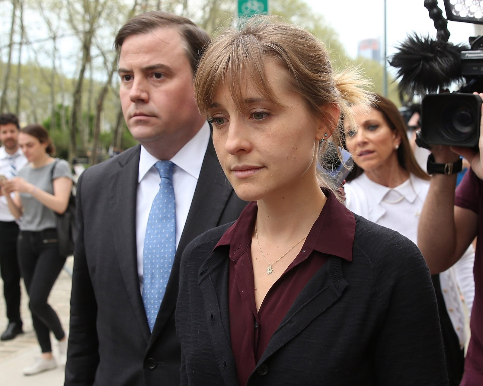 Actress Allison Mack (R) departs the United States Eastern District Court after a bail hearing in relation to the sex trafficking charges filed against her on May 4, 2018 in the Brooklyn borough of New York City. The actress known for her role on 'Smallville' is charged with sex trafficking. Along with alleged cult leader Keith Raniere, prosecutors say Mack recruited women to an upstate New York mentorship group NXIVM that turned them into sex slaves. (Photo by Jemal Countess/Getty Images)