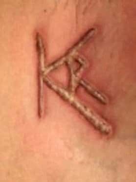 The DOS of the organization were branded with Keith Raniere's initials (FBI)